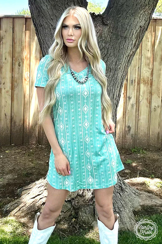 WALKING IN TURQUOISE DRESS